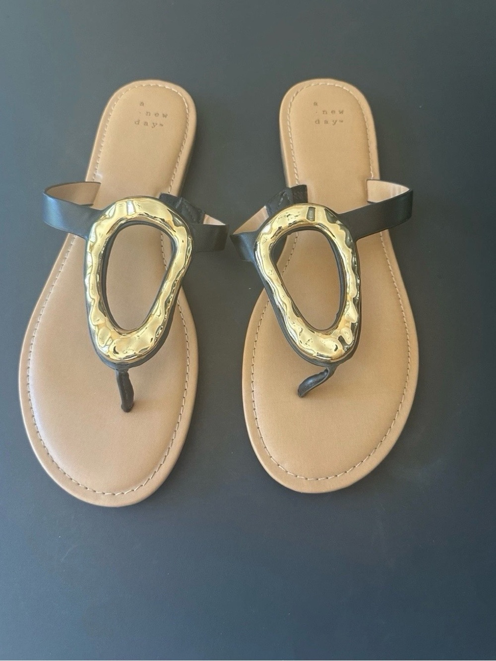 a new day Black Thong Sandals with Gold Oval Accent
